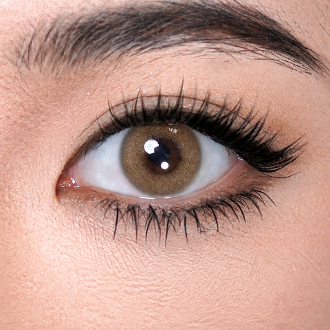 FreshGo Euroring Mel Beige coloured contact lens worn on eye
