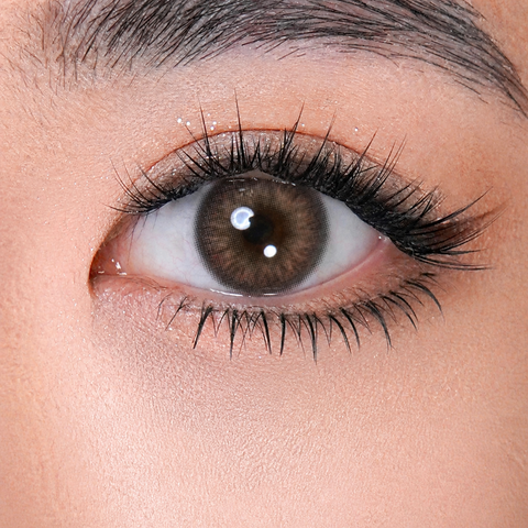 FreshGo Iris Cocoa Brown coloured contact lens worn on eye